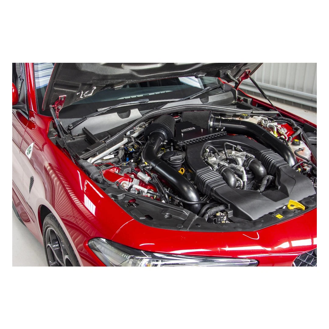 Red car with open hood showing engine components on a white background