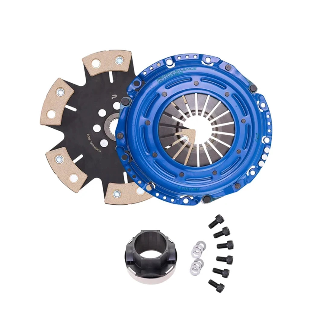 A clutch kit set including a blue pressure plate, a black and beige flywheel, a black release bearing