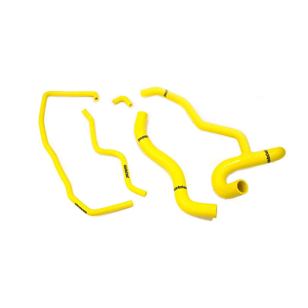 yellow silicone hoses on a white background