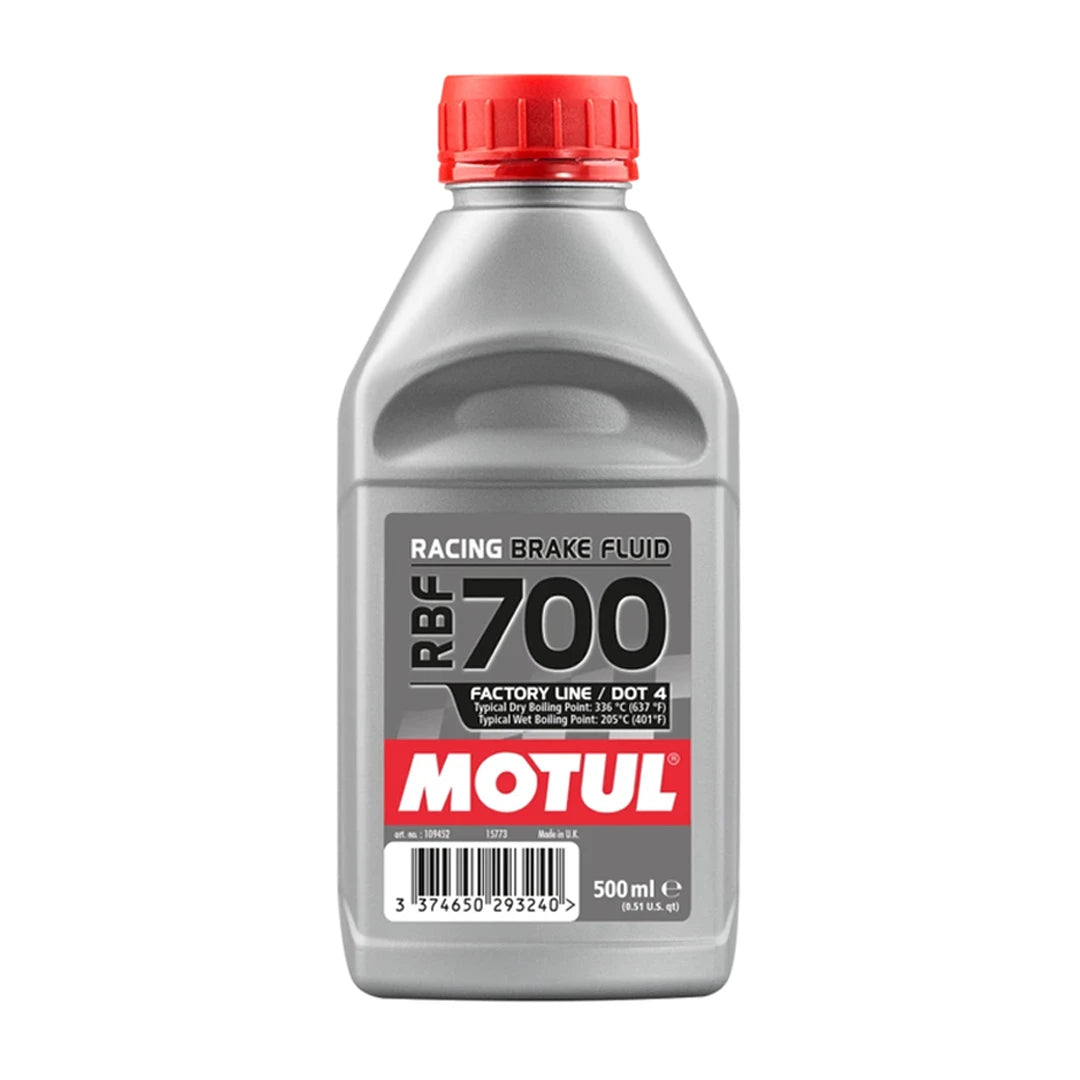 Bottle of Motul RBF 700 racing brake fluid on a white background