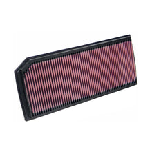 K&N red pleated high performance air filter on a white background