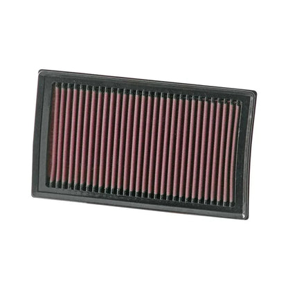 K&N red pleated high performance air filter on a white background