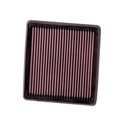 K&N red pleated high performance air filter on a white background