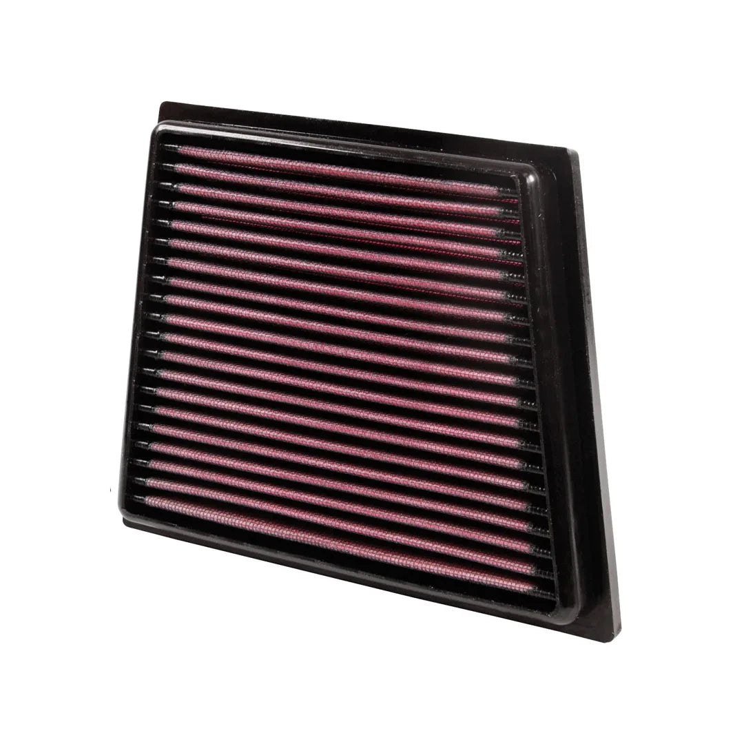 K&N red pleated high performance air filter on a white background