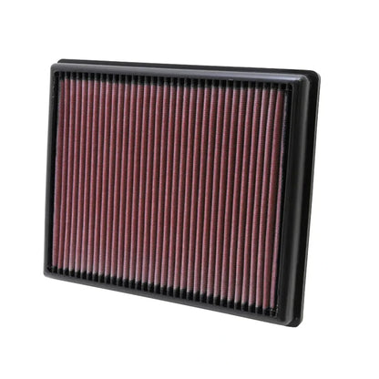 K&N red pleated high performance air filter on a white background
