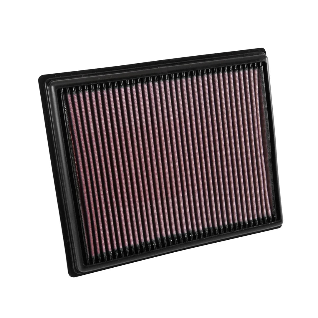 K&N red pleated high performance air filter on a white background