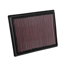 K&N red pleated high performance air filter on a white background