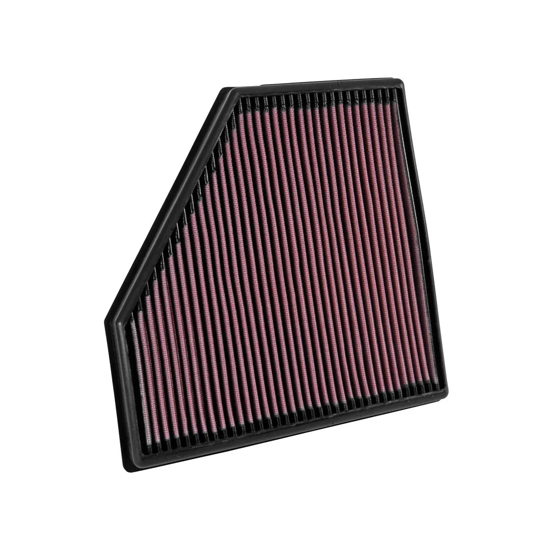 K&N red pleated high performance air filter on a white background