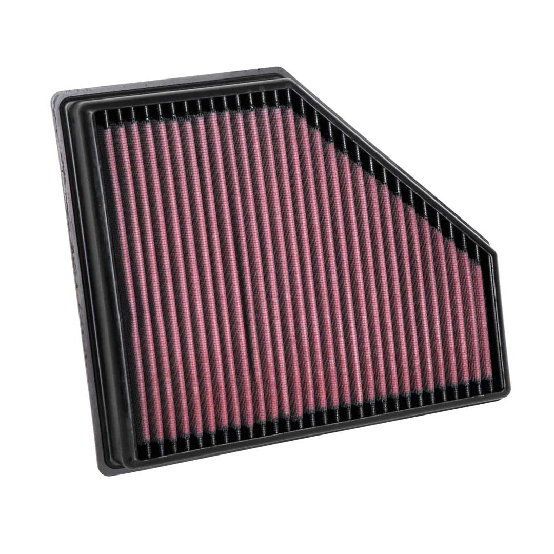 K&N red pleated high performance air filter on a white background