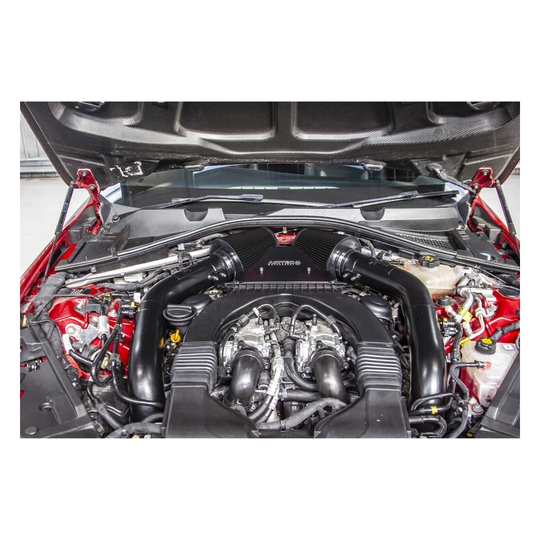 Car engine with visible branding on a white background