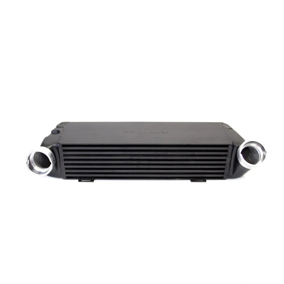 Black intercooler with silver pipes on a white background