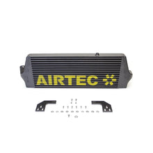 Black Airtec intercooler and fittings on a white background