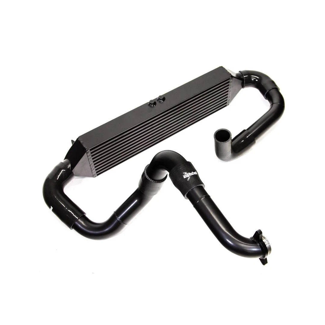 Black AIRTEC intercooler and pipework on a white background