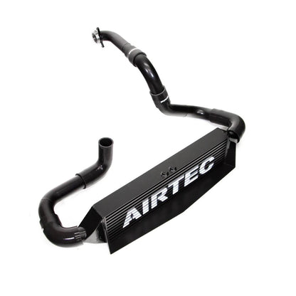 Black AIRTEC intercooler and pipework on a white background