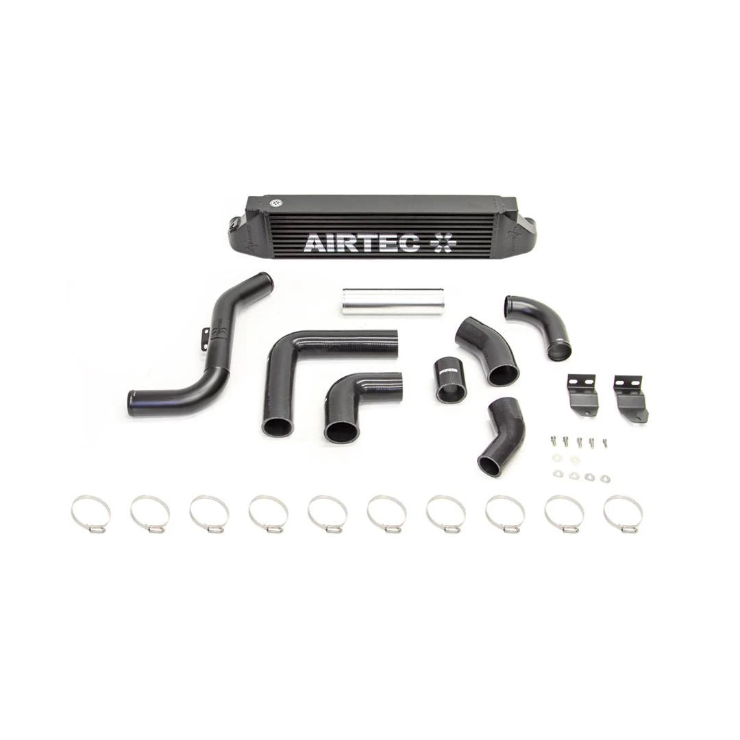 Black Airtec intercooler and fittings on a white background