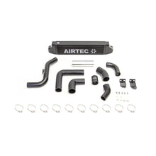 Black Airtec intercooler and fittings on a white background