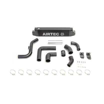Black Airtec intercooler and fittings on a white background
