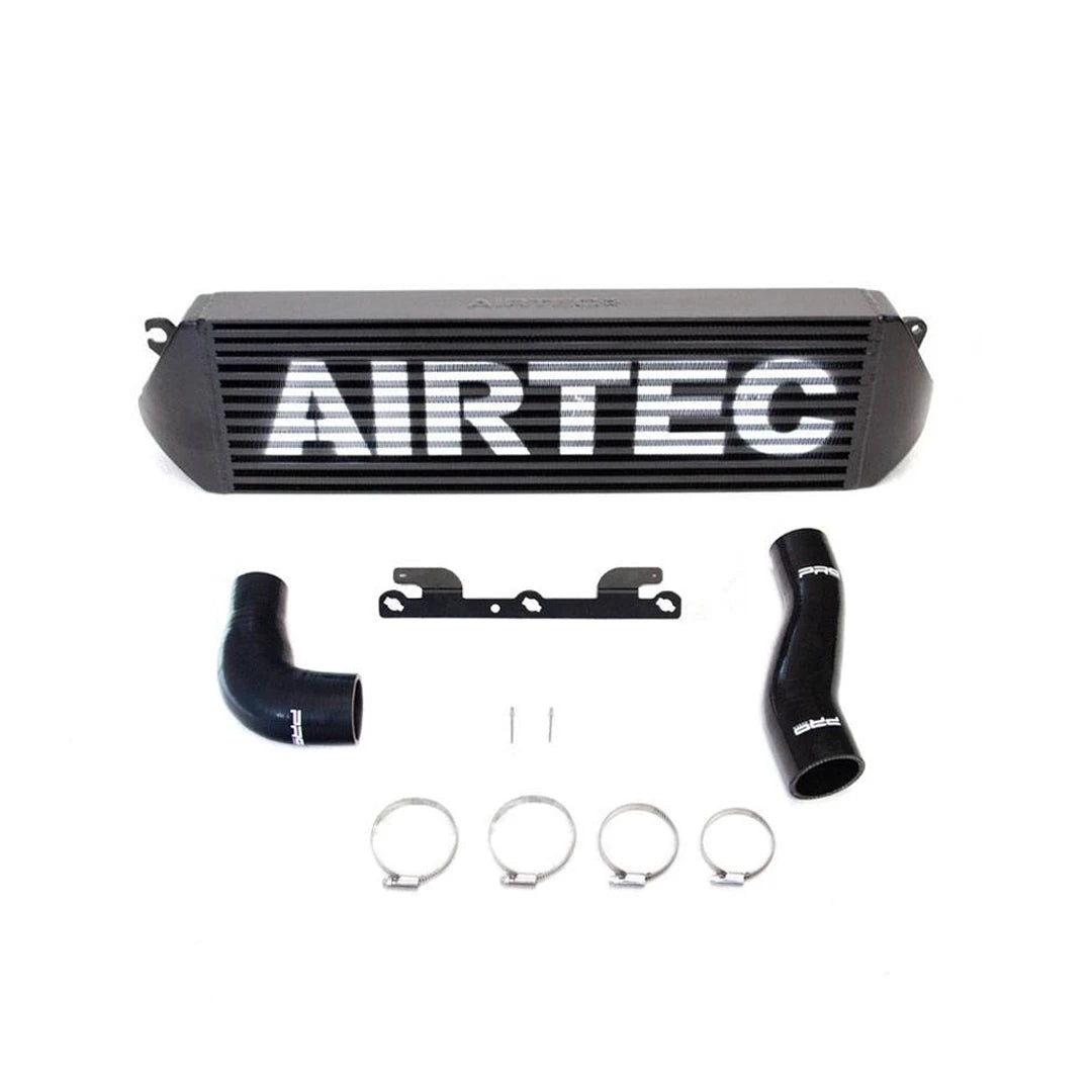 Black AIRTEC intercooler and pipework on a white background