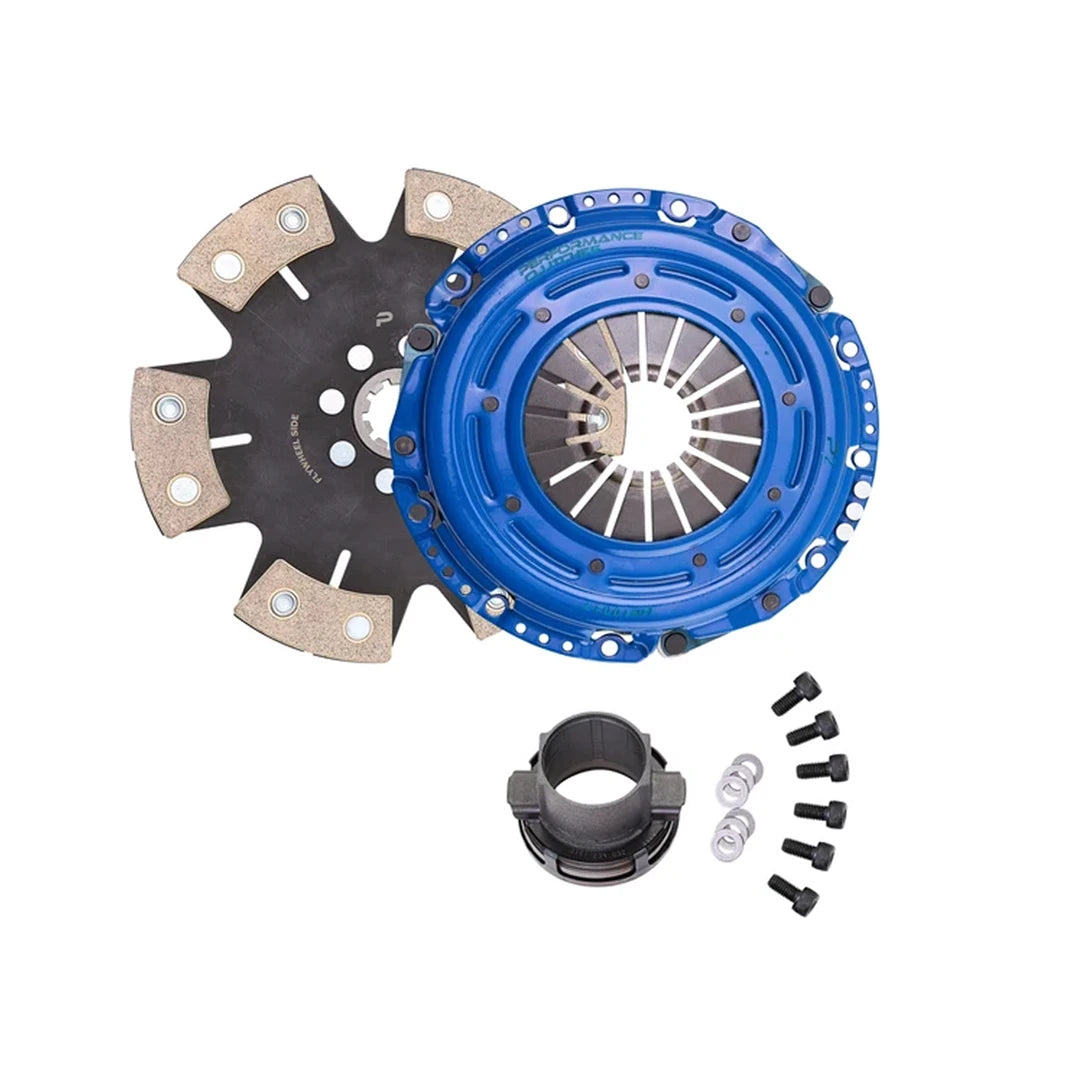 A clutch kit including a blue anodized pressure plate, a black and silver friction plate, a black release bearing