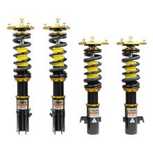 Set of four yellow speed racing coilovers on a white background