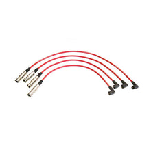 A set of red high-tension ignition leads with black connectors at each end.