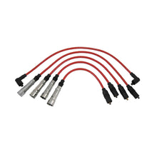 A set of red 8mm silicone high-tension leads with metal connectors for vehicle ignition systems.